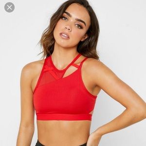NIKE Rebel Slash Sports Bra Mesh Asymmetrical